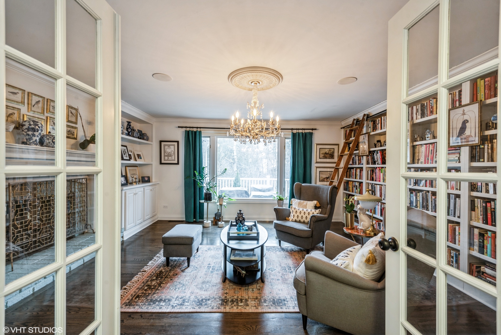 6208 Katmai Trail McHenry, IL 60050 - Photo 8 of 24 a living room with furniture or chandelier and a wooden floor