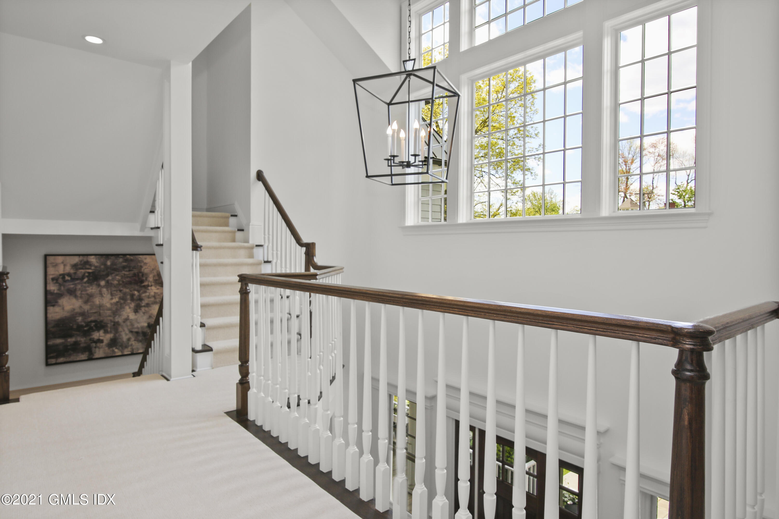 16 Benjamin Street Old Greenwich, CT 06870 - Photo 16 of 32 a view of hallway with windows