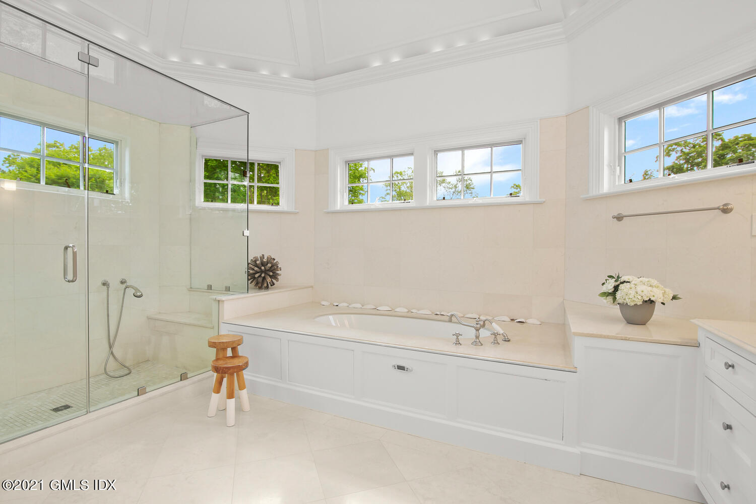 16 Benjamin Street Old Greenwich, CT 06870 - Photo 18 of 32 a bathroom with a tub a sink and a window