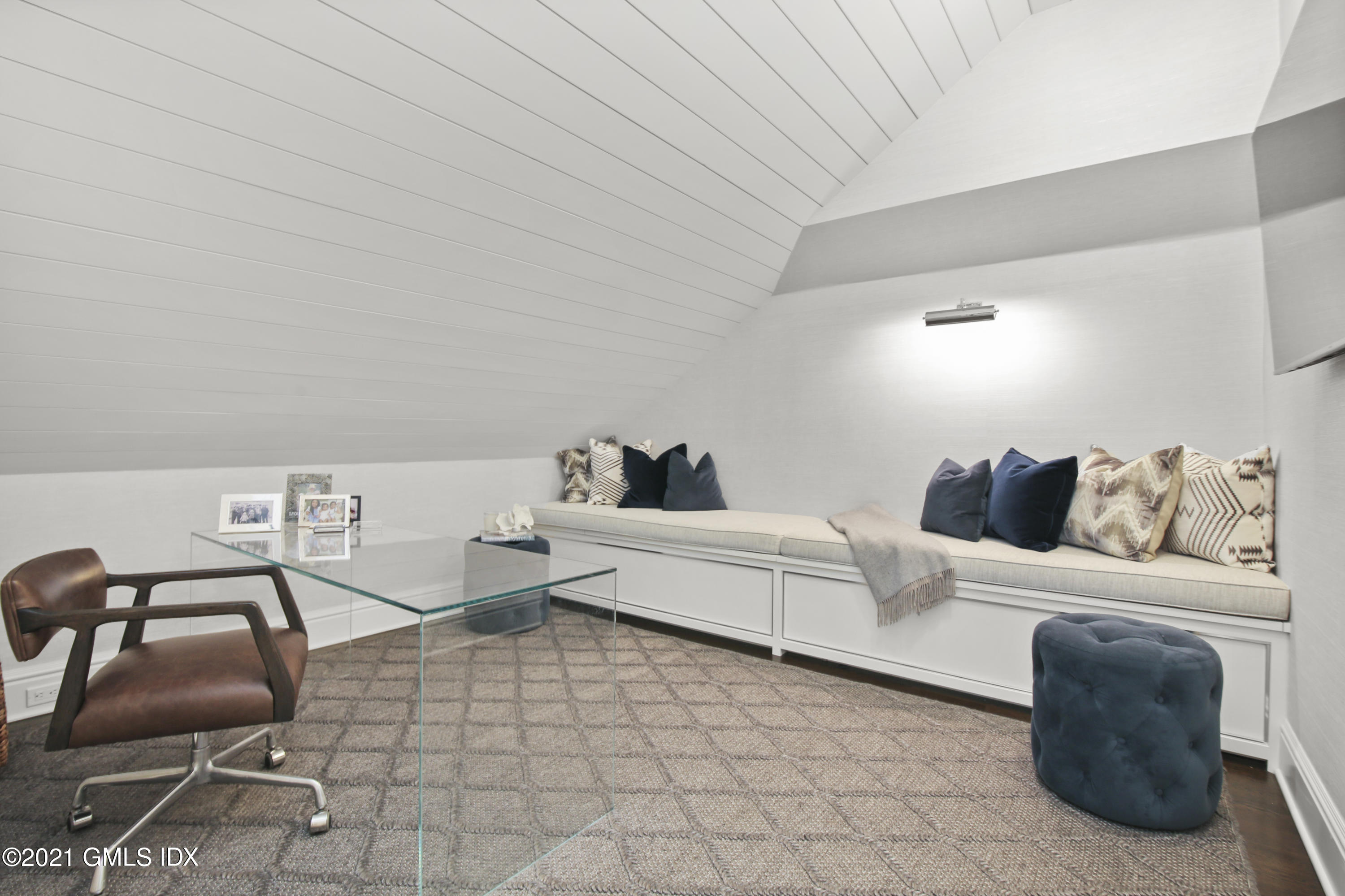 16 Benjamin Street Old Greenwich, CT 06870 - Photo 24 of 32 a living room with furniture and a couch