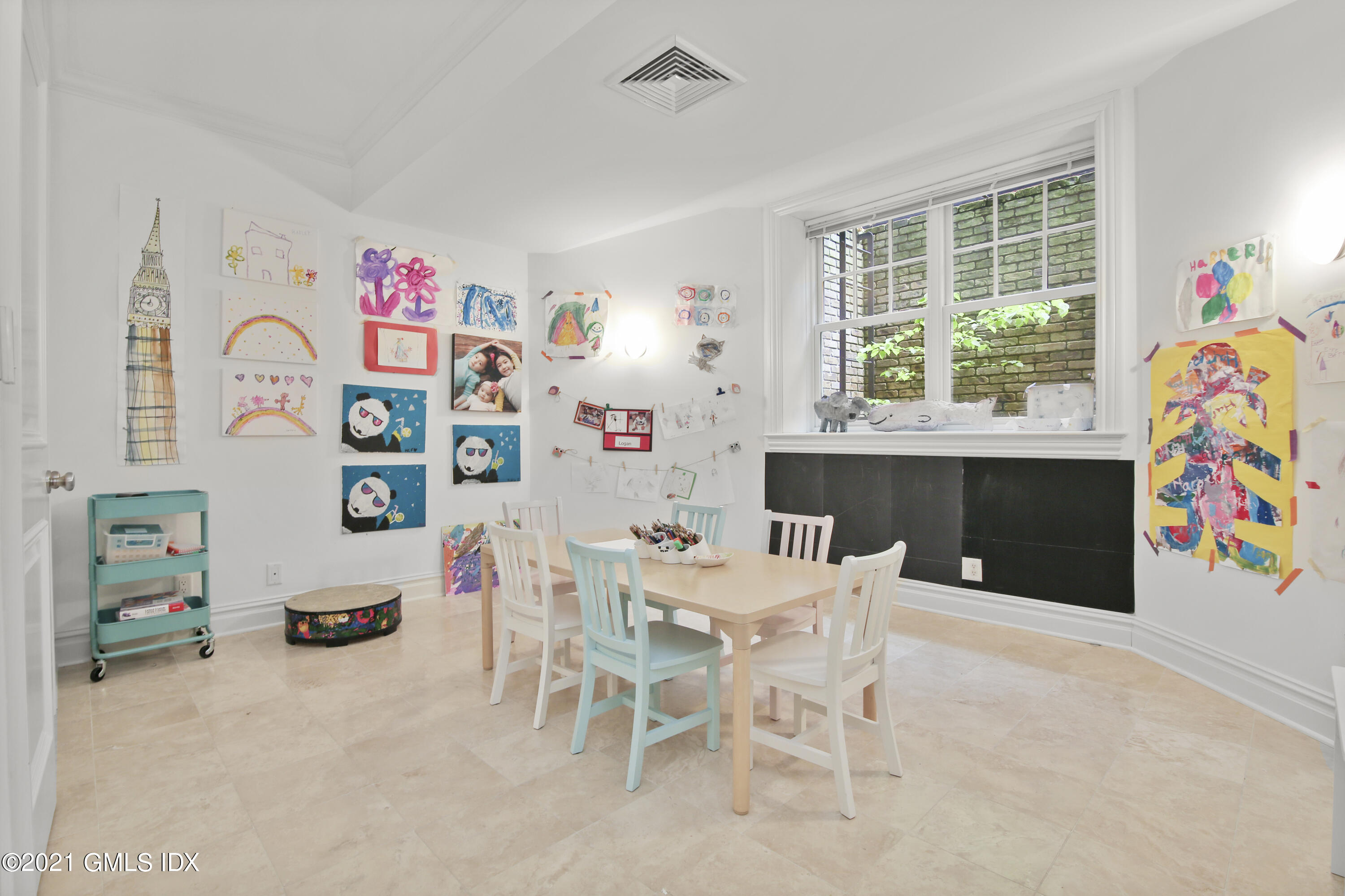 16 Benjamin Street Old Greenwich, CT 06870 - Photo 26 of 32 a dining room with a window and furniture