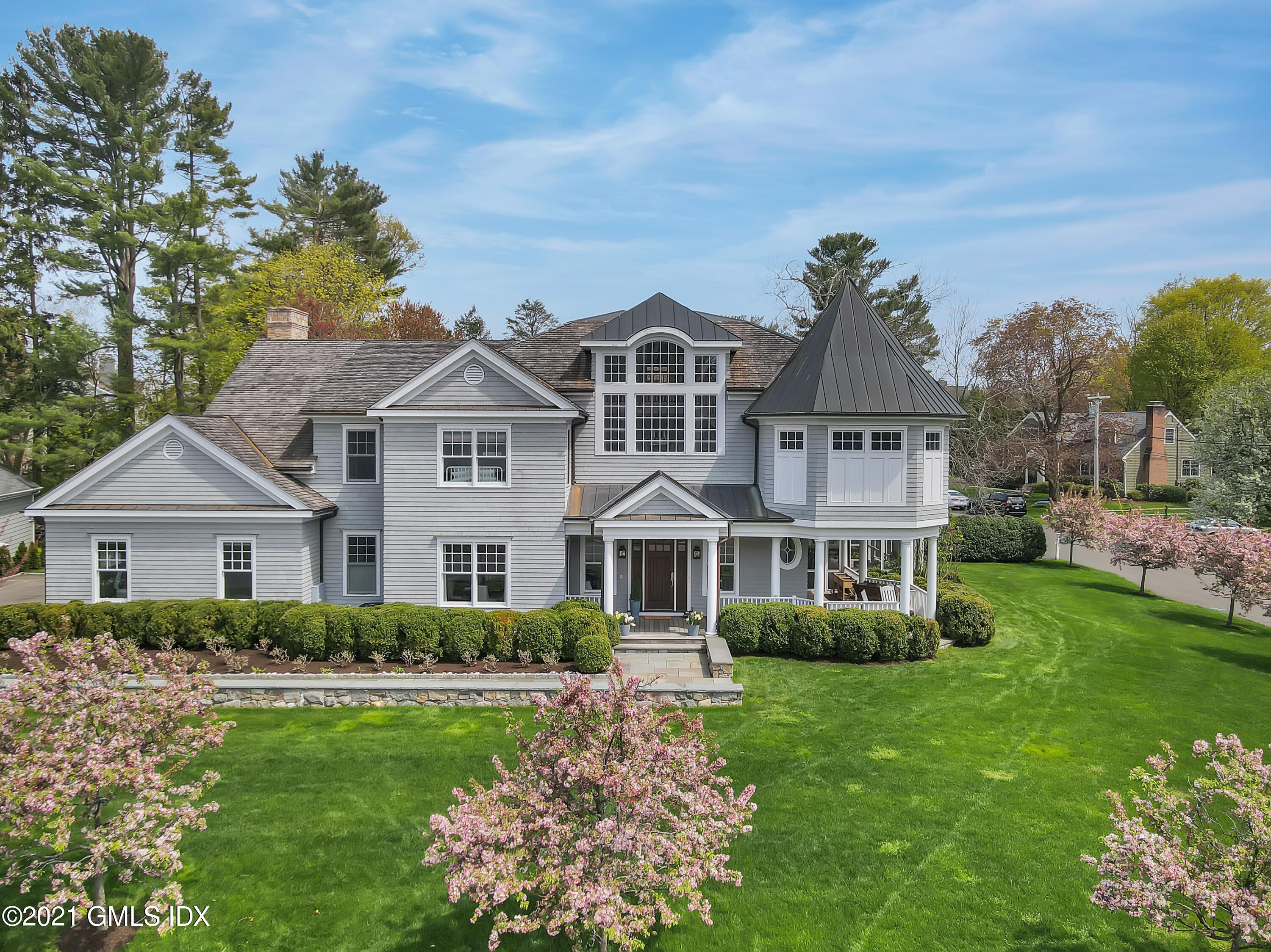 16 Benjamin Street Old Greenwich, CT 06870 - Photo 32 of 32 a front view of a house with a yard