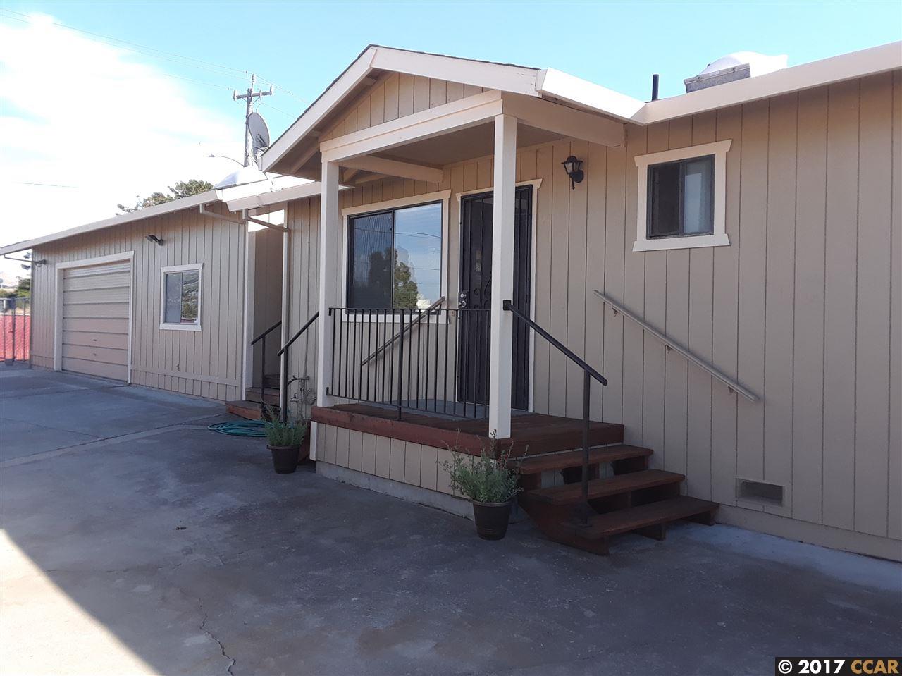1359 Mahoney Street, Unit C Rodeo, CA 94572 - Photo 1 of 1 a view of a house with wooden floor and a small yard