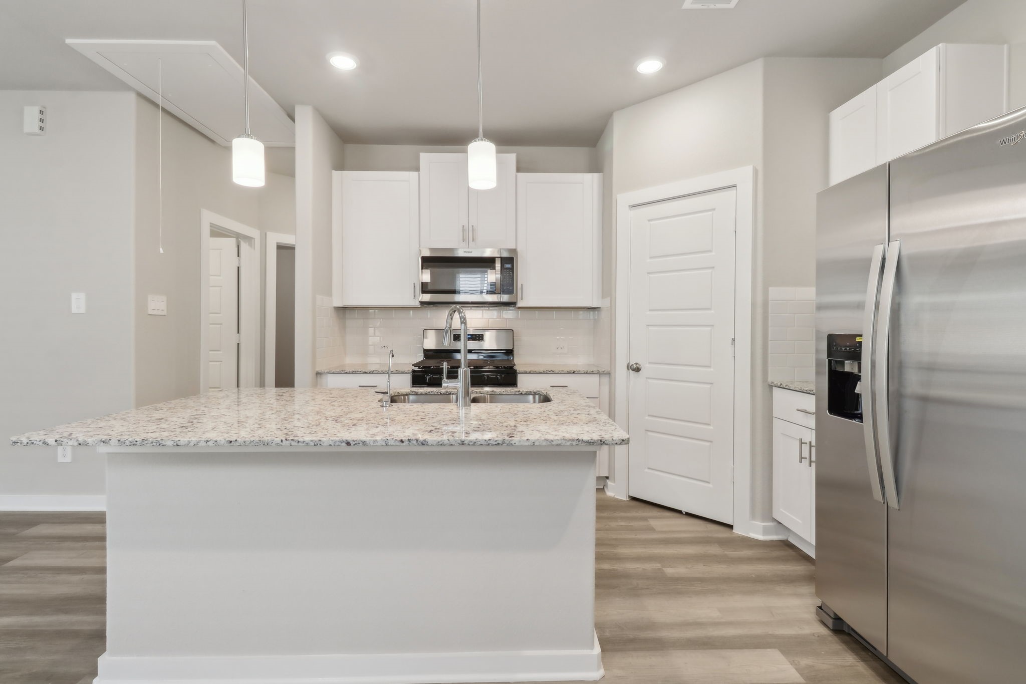 14301 Grey Pointe Court Conroe, TX 77302 - Photo 1 of 25 Photo is not of the actual home, but is an inspirational photo of builder’s model home and may depict options, furnishings, and/or decorator features that are not included