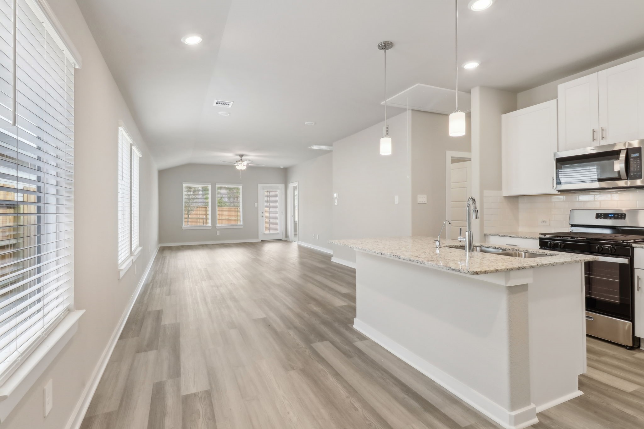 14301 Grey Pointe Court Conroe, TX 77302 - Photo 5 of 25 Photo is not of the actual home, but is an inspirational photo of builder’s model home and may depict options, furnishings, and/or decorator features that are not included