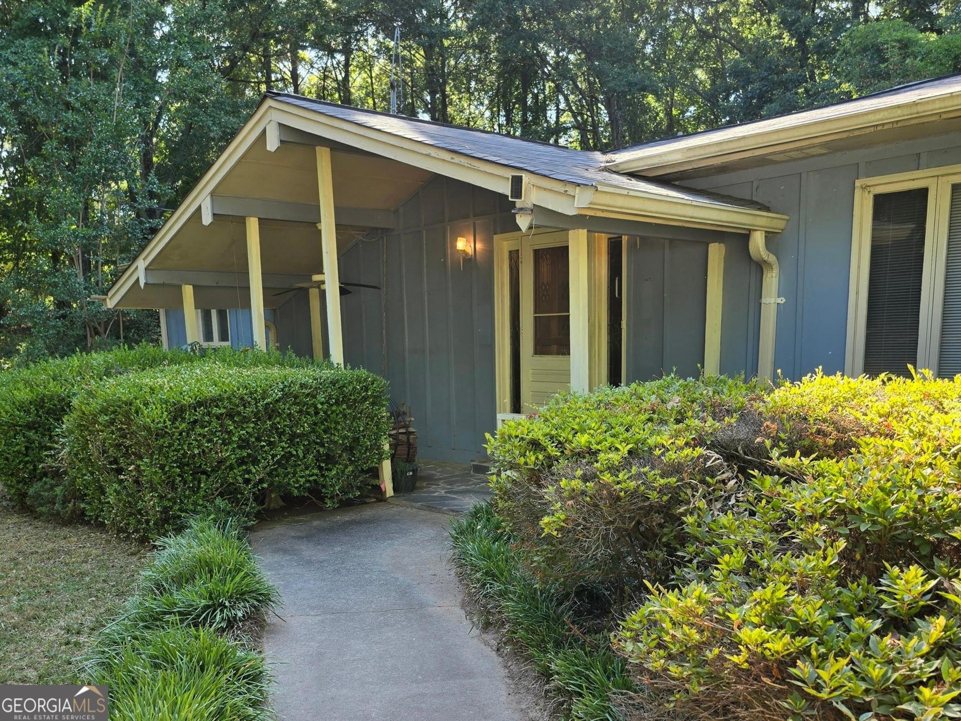 330 Valley Hill Road Stockbridge, GA 30281 - Photo 1 of 1 a front view of a house with garden