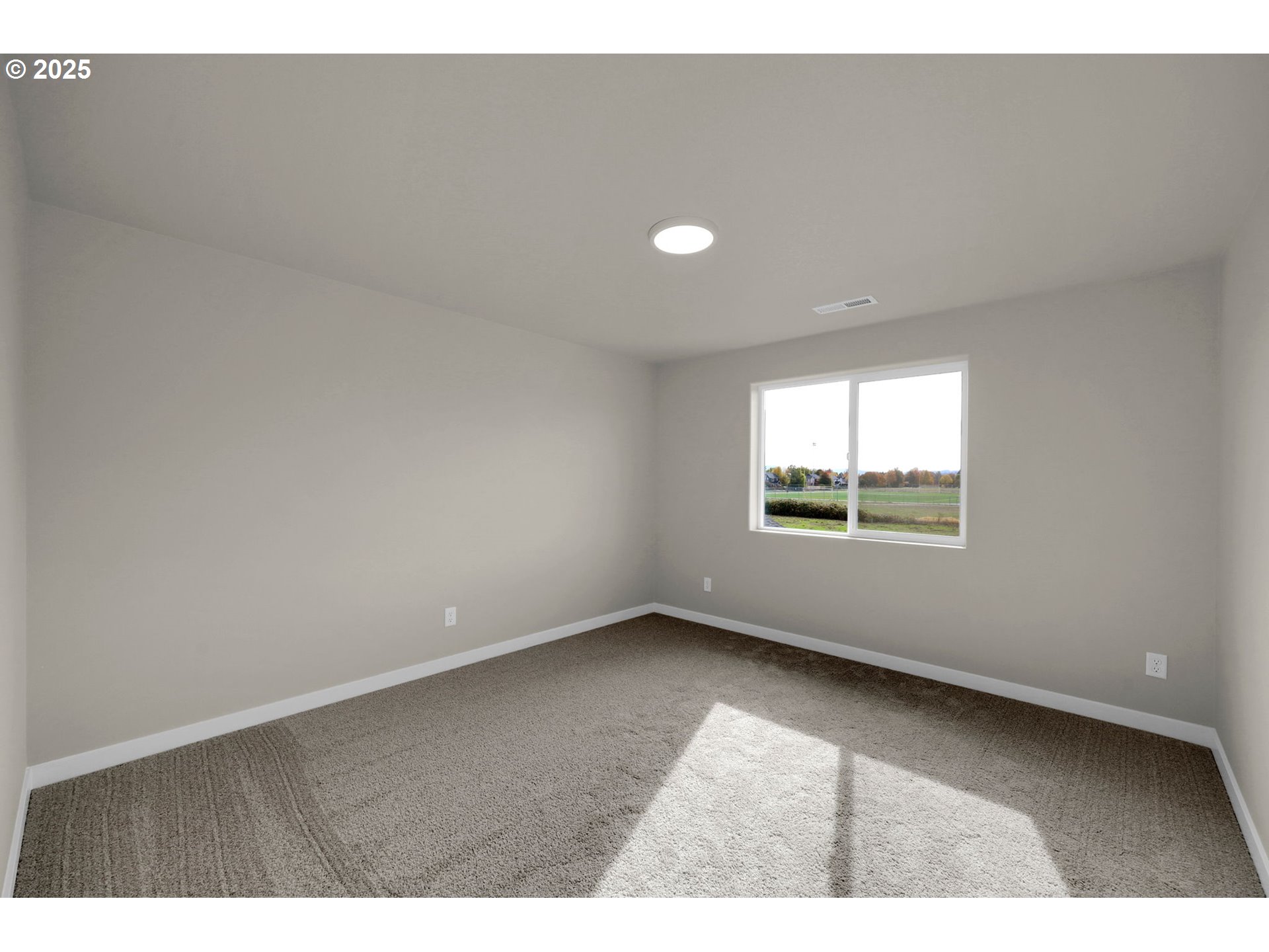 5679 Magnificence Way Eugene, OR 97402 - Photo 27 of 45 a view of an empty room with a window