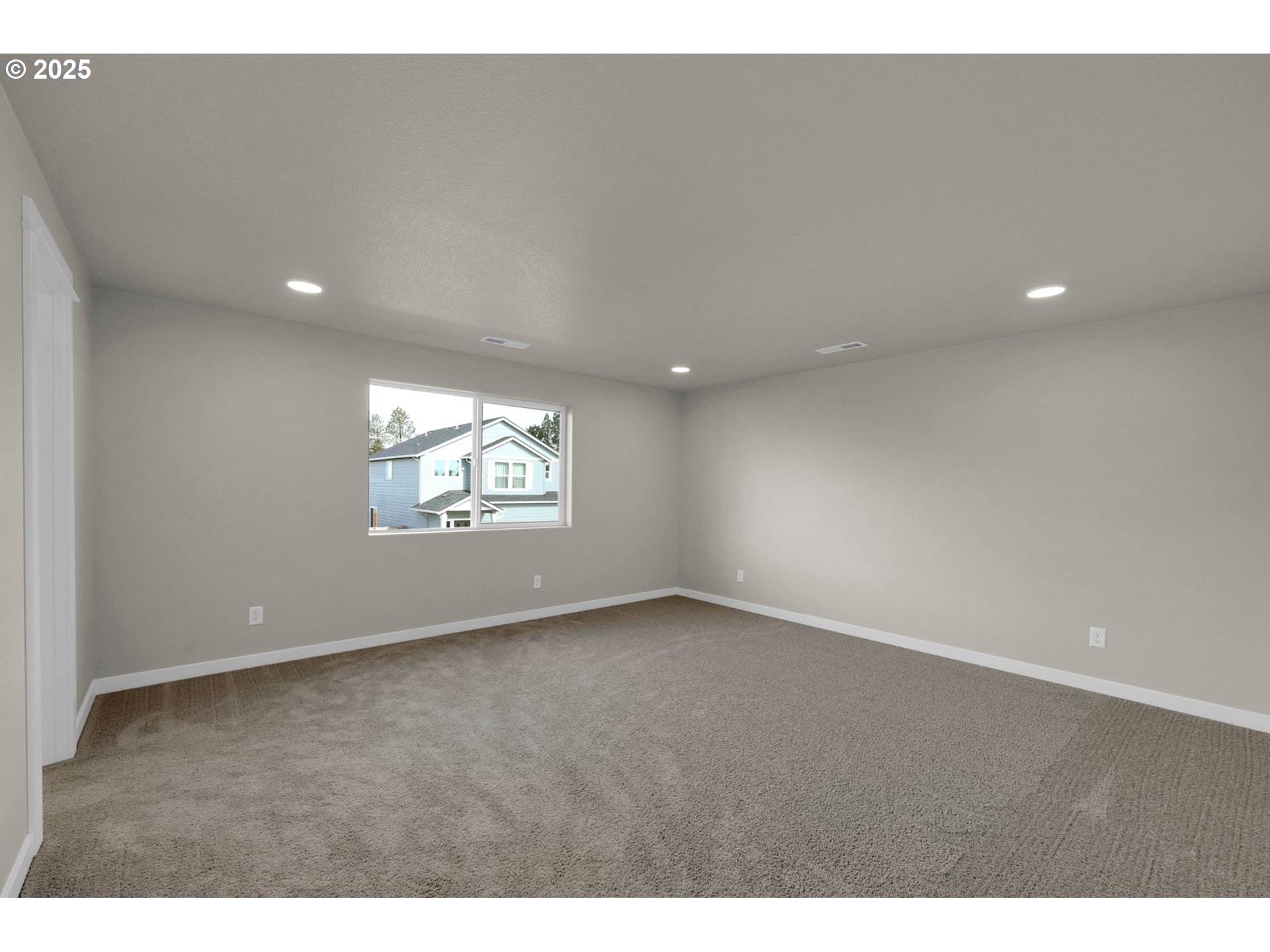 5679 Magnificence Way Eugene, OR 97402 - Photo 29 of 45 a view of an empty room and a window