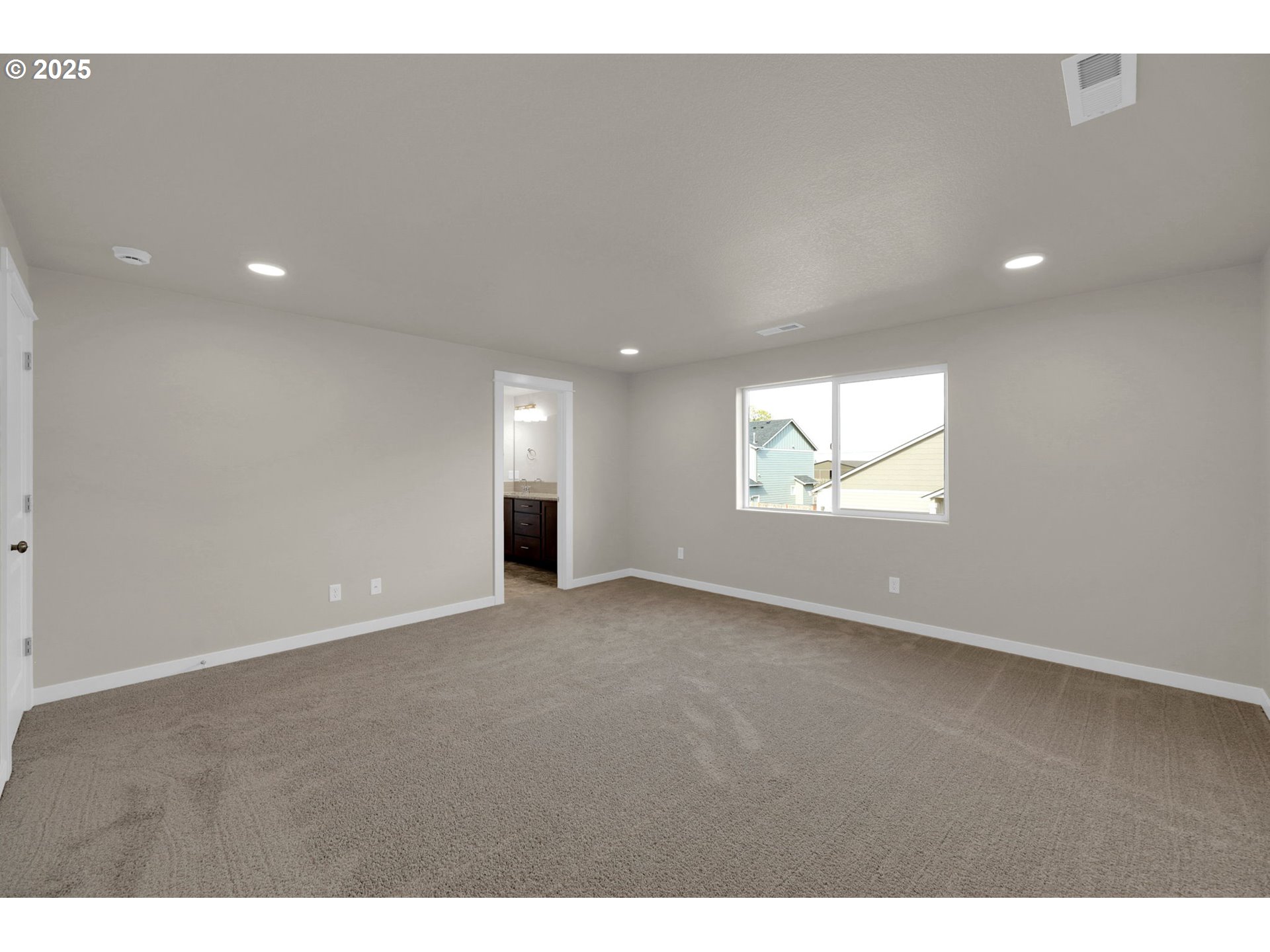 5679 Magnificence Way Eugene, OR 97402 - Photo 32 of 45 a view of an empty room and a window