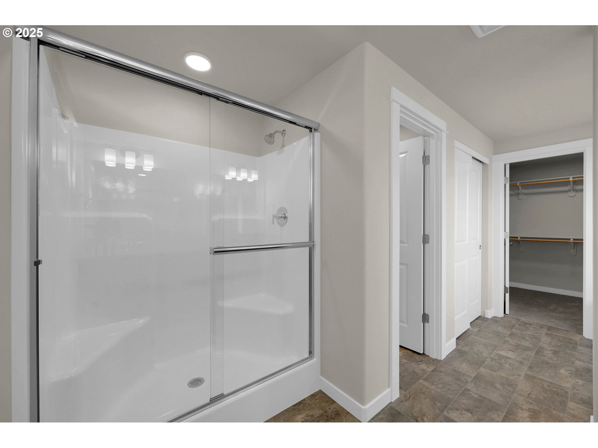 5679 Magnificence Way Eugene, OR 97402 - Photo 34 of 45 a bathroom with a glass shower door