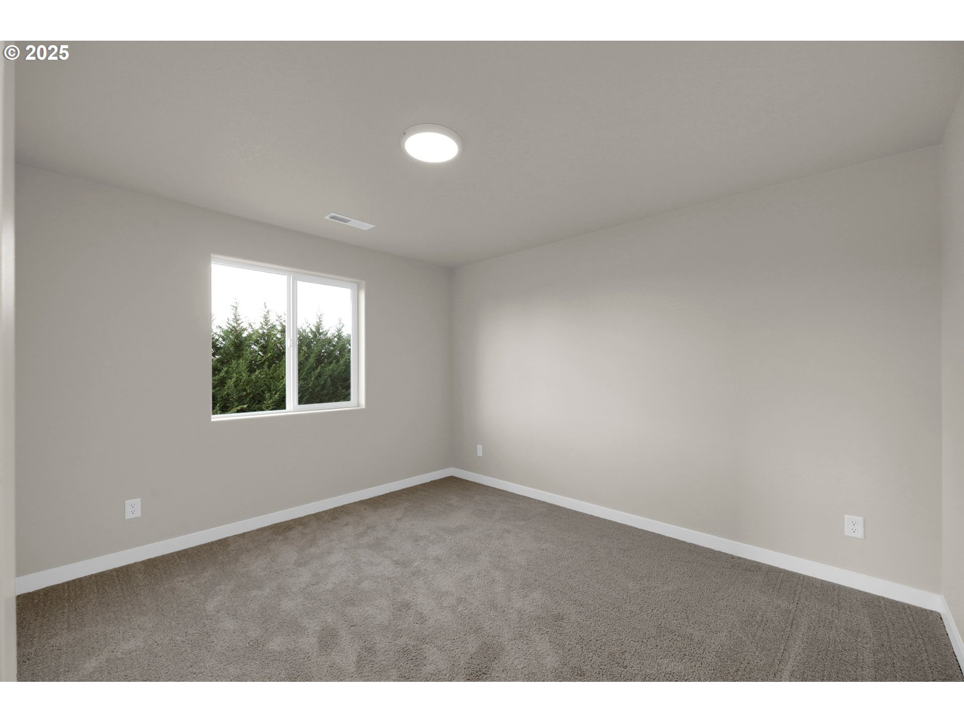 5679 Magnificence Way Eugene, OR 97402 - Photo 39 of 45 a view of an empty room with a window