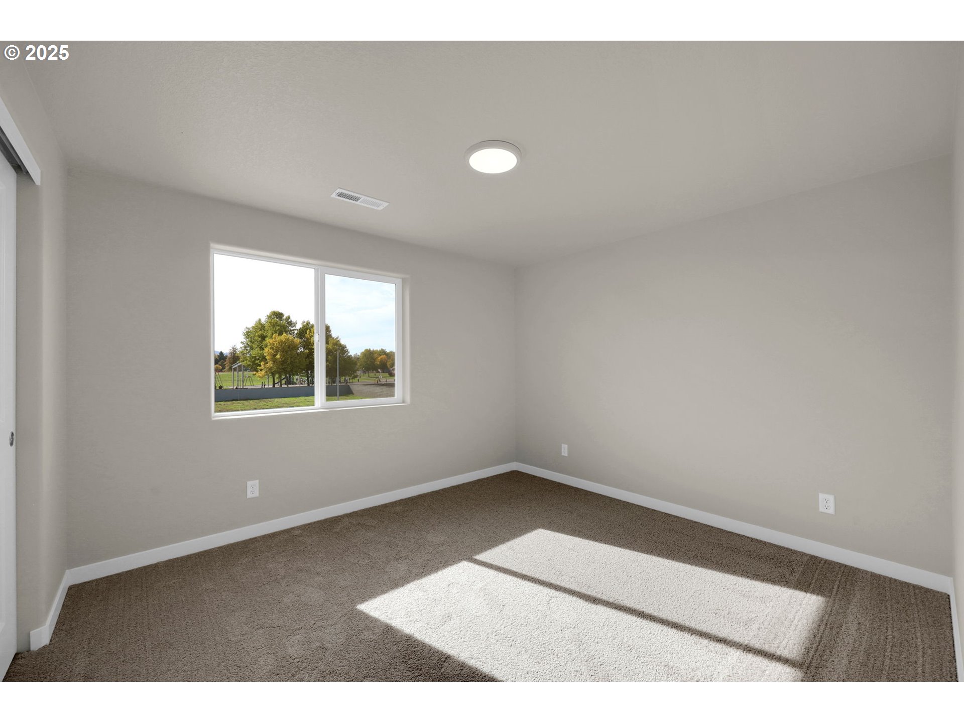 5679 Magnificence Way Eugene, OR 97402 - Photo 41 of 45 a view of an empty room with a window