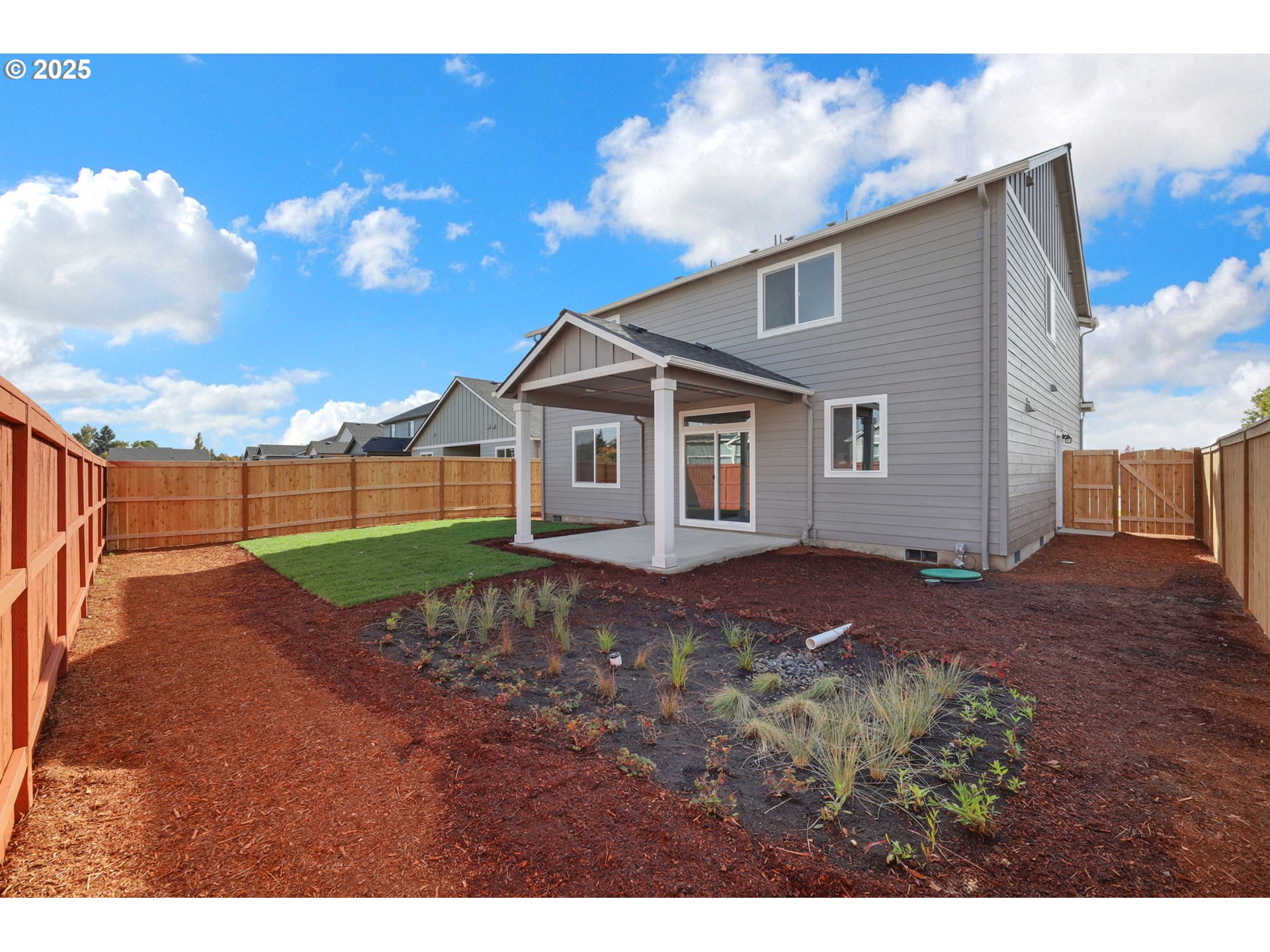 5679 Magnificence Way Eugene, OR 97402 - Photo 44 of 45 a view of backyard of house with green space