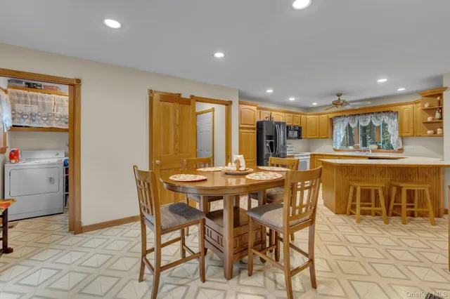 a view of a dining room with furniture