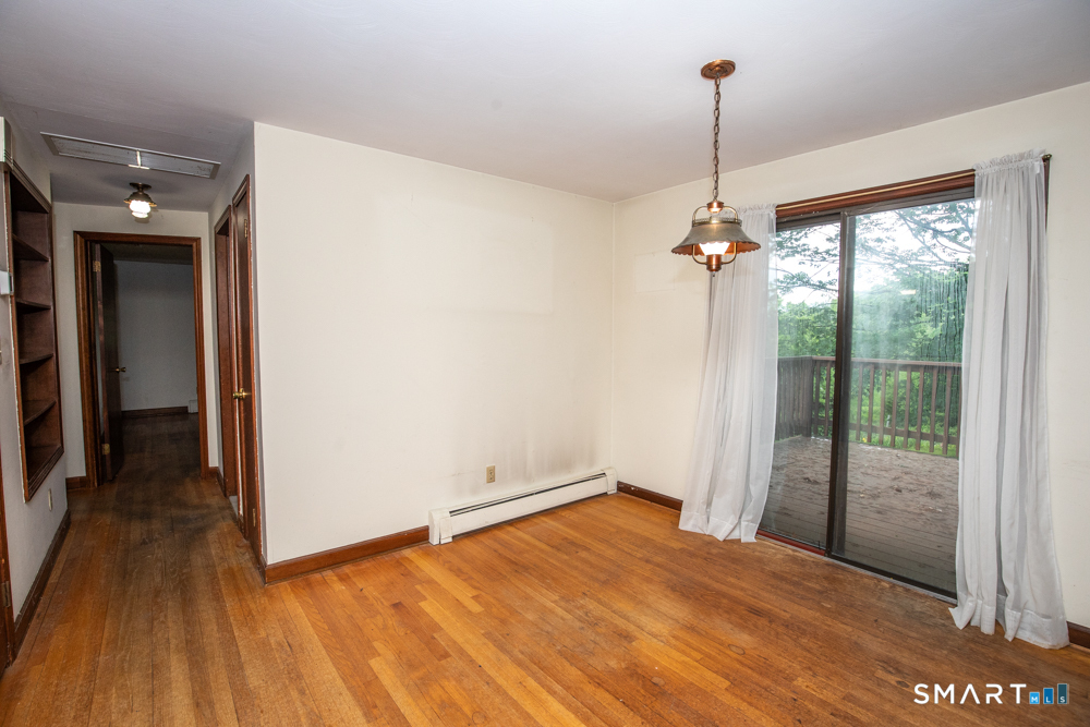 64 Somer Drive Meriden, CT 06451 - Photo 11 of 28 a view of a room with a ceiling fan and window