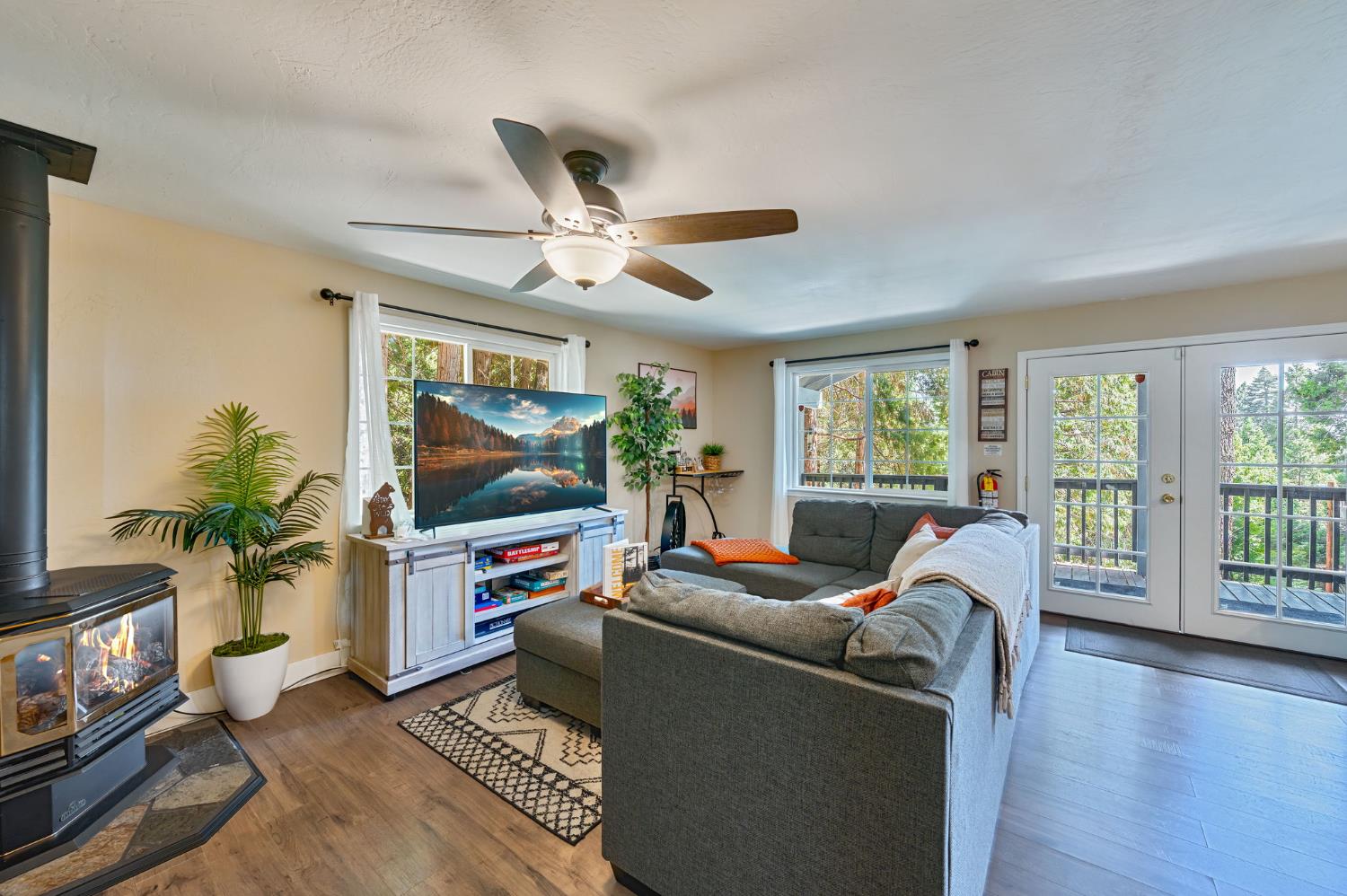 3960 Garnet Road Pollock Pines, CA 95726 - Photo 12 of 50 a living room with furniture and a flat screen tv