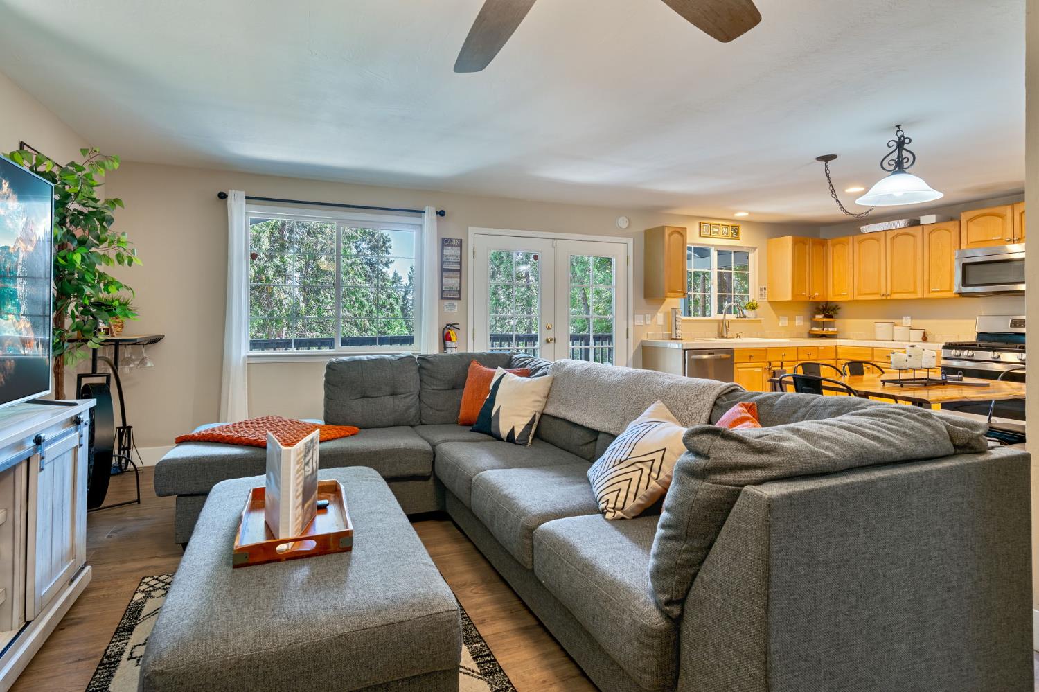 3960 Garnet Road Pollock Pines, CA 95726 - Photo 14 of 50 a living room with furniture fireplace and a large window