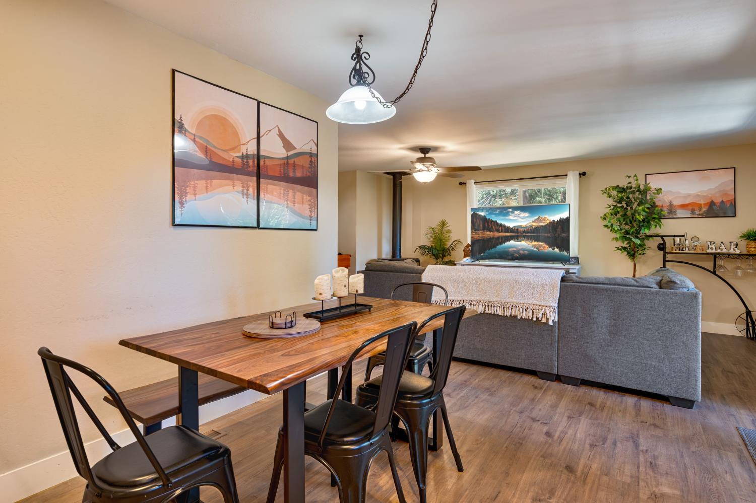 3960 Garnet Road Pollock Pines, CA 95726 - Photo 19 of 50 a view of a dining room with furniture and wooden floor