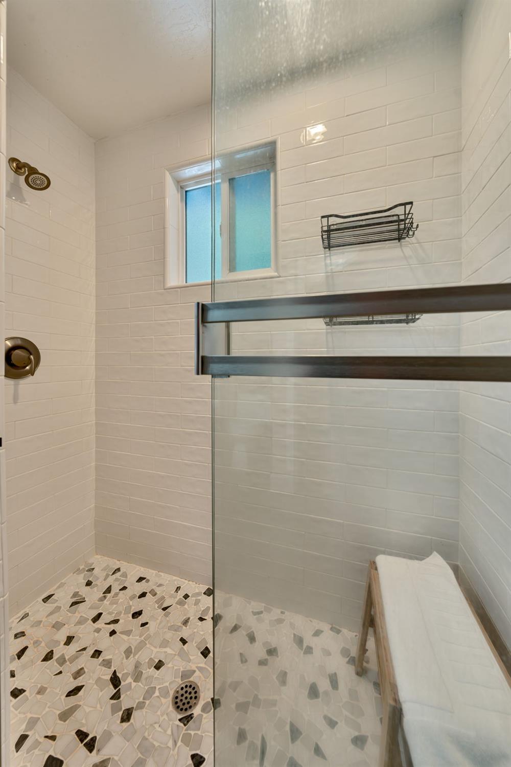 3960 Garnet Road Pollock Pines, CA 95726 - Photo 25 of 50 a bathroom with a sink a toilet a shower and a mirror