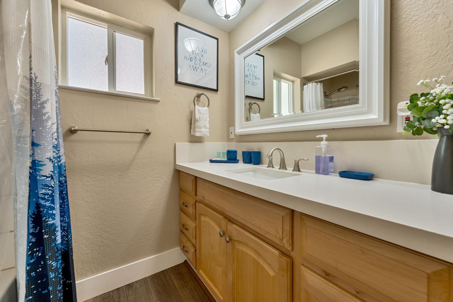 3960 Garnet Road Pollock Pines, CA 95726 - Photo 30 of 50 a bathroom with a sink and a mirror