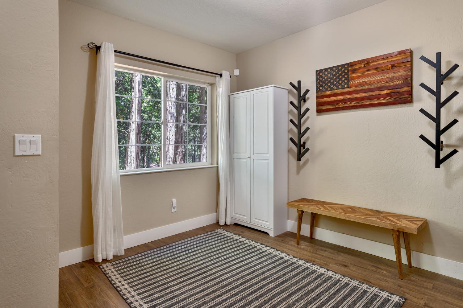 3960 Garnet Road Pollock Pines, CA 95726 - Photo 35 of 50 a view of a livingroom with wooden floor and furniture