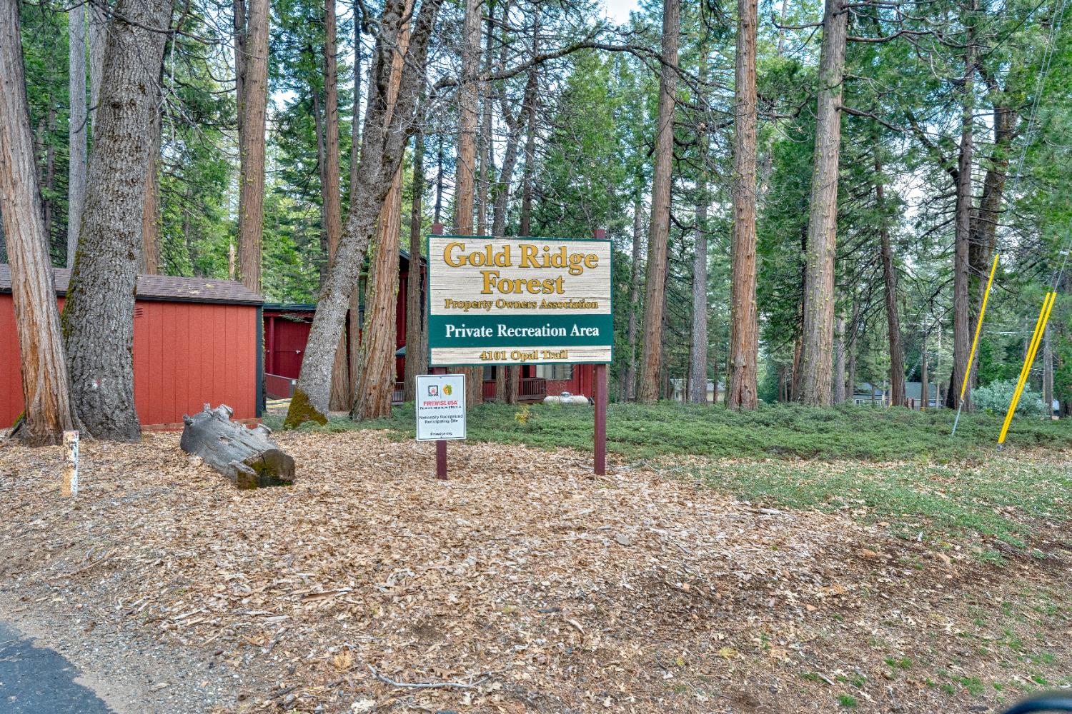 3960 Garnet Road Pollock Pines, CA 95726 - Photo 50 of 50 a sign that is sitting in front of a house