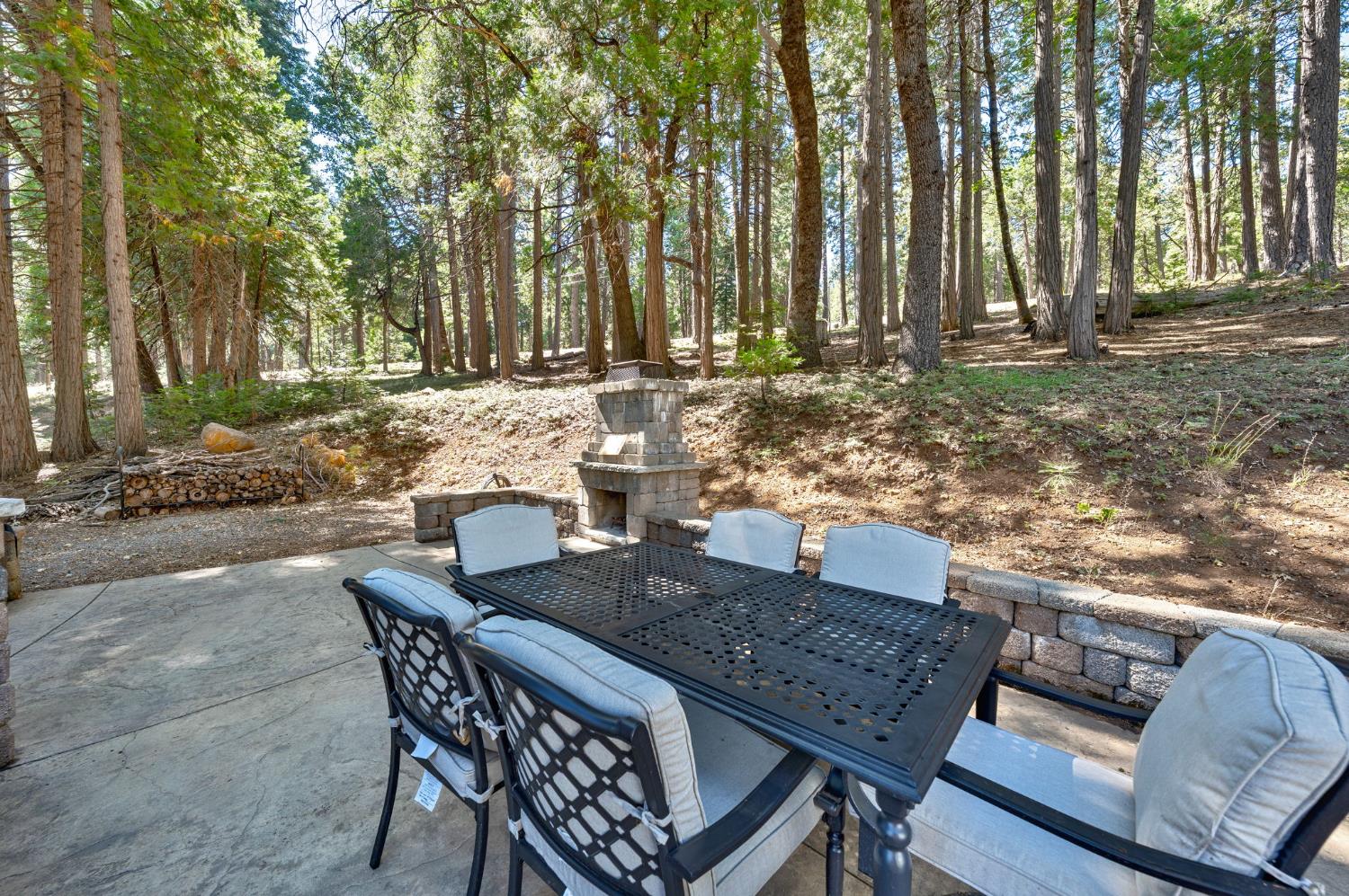 3960 Garnet Road Pollock Pines, CA 95726 - Photo 6 of 50 a view of a backyard with sitting area