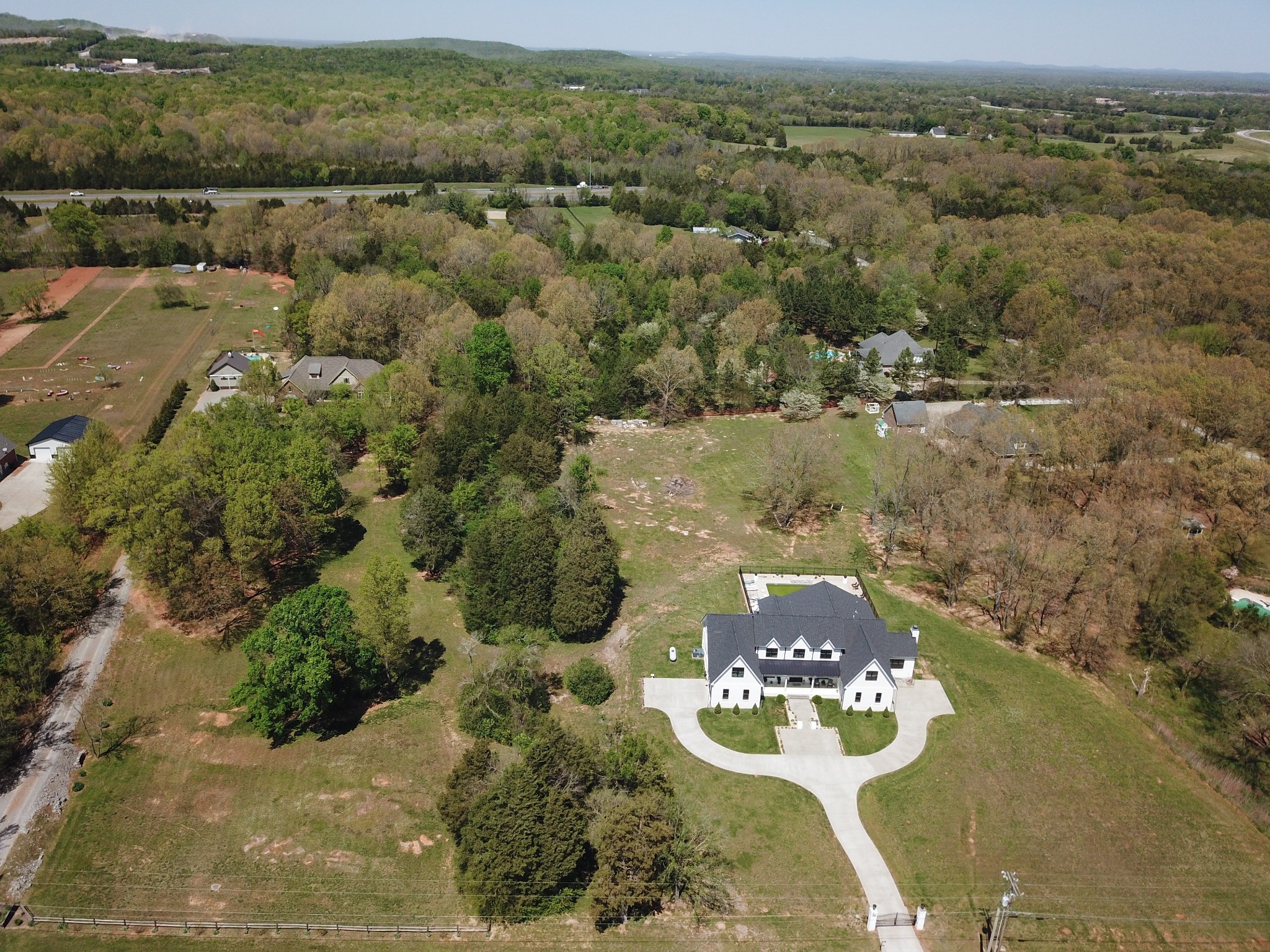 4218 Shores Road Murfreesboro, TN 37128 - Photo 2 of 13 an aerial view of a house with a yard