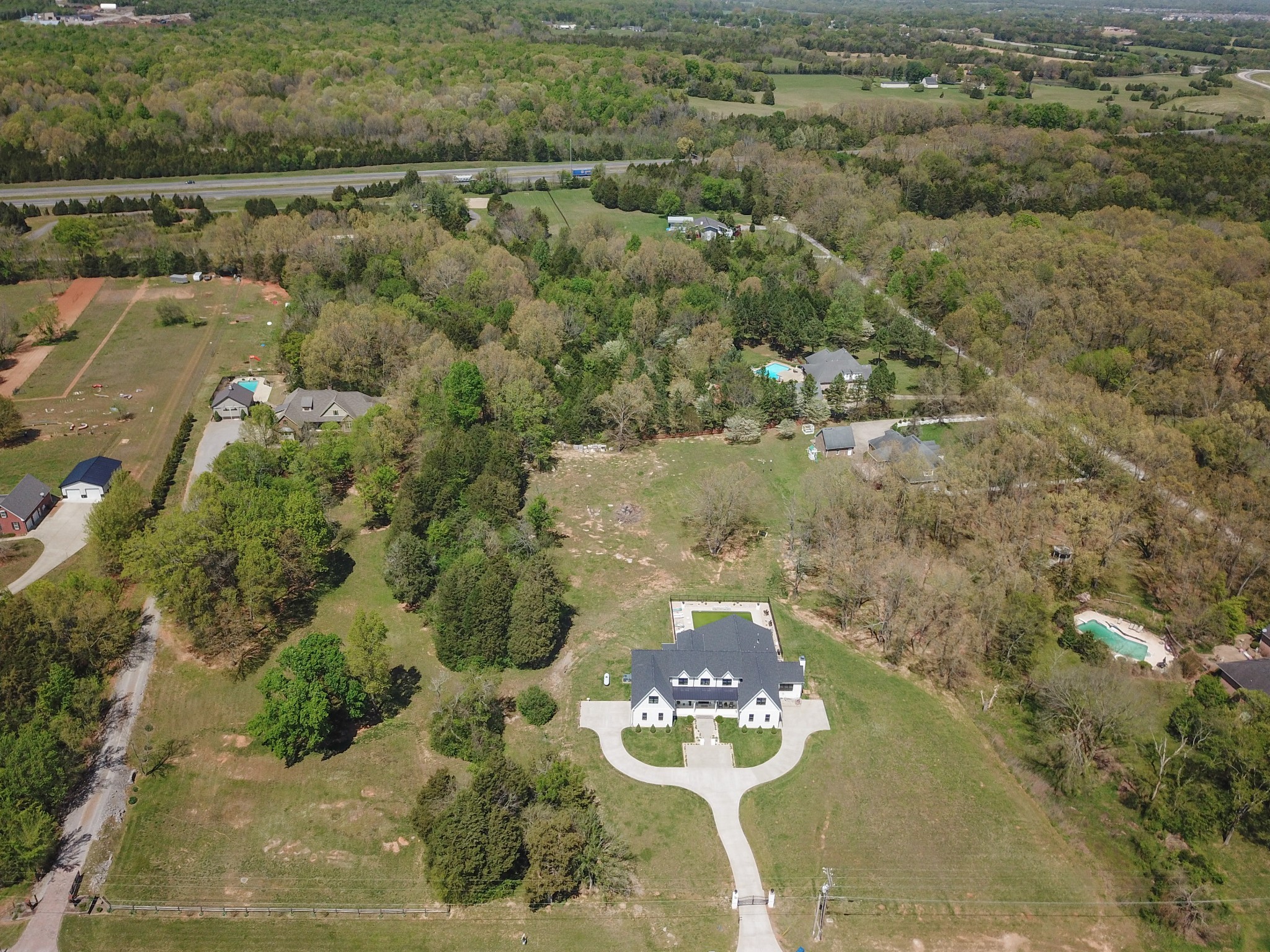 4218 Shores Road Murfreesboro, TN 37128 - Photo 5 of 13 an aerial view of a house with a yard