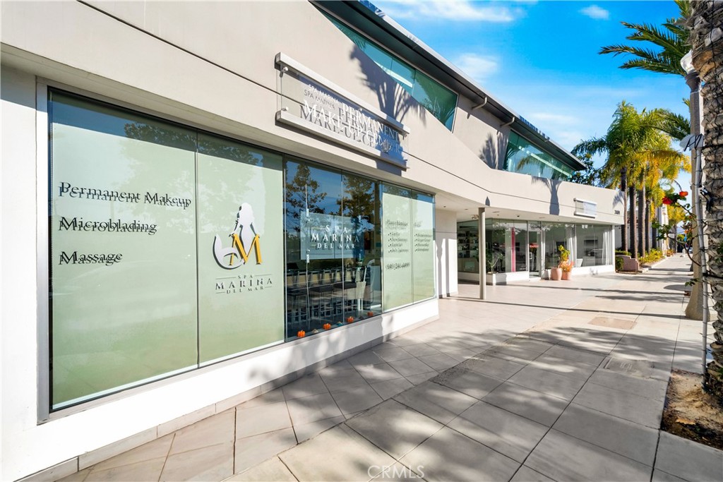 24691 Del Prado Avenue Dana Point, CA 92629 - Photo 13 of 67 a outdoor view of a building with traffic signal lights
