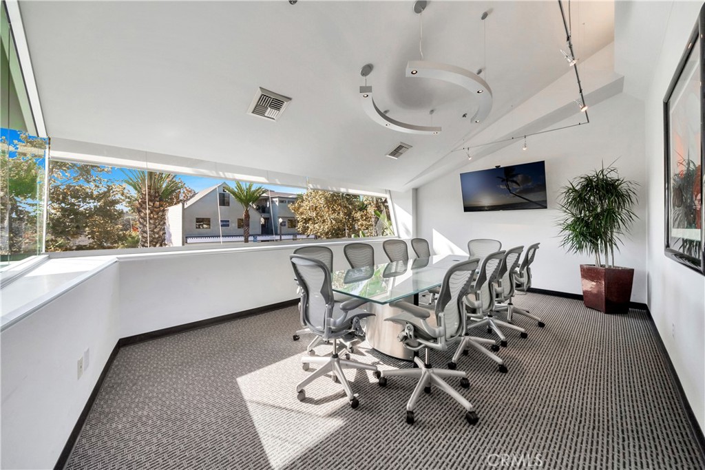 24691 Del Prado Avenue Dana Point, CA 92629 - Photo 27 of 67 a view of a dining room with furniture window and outside view