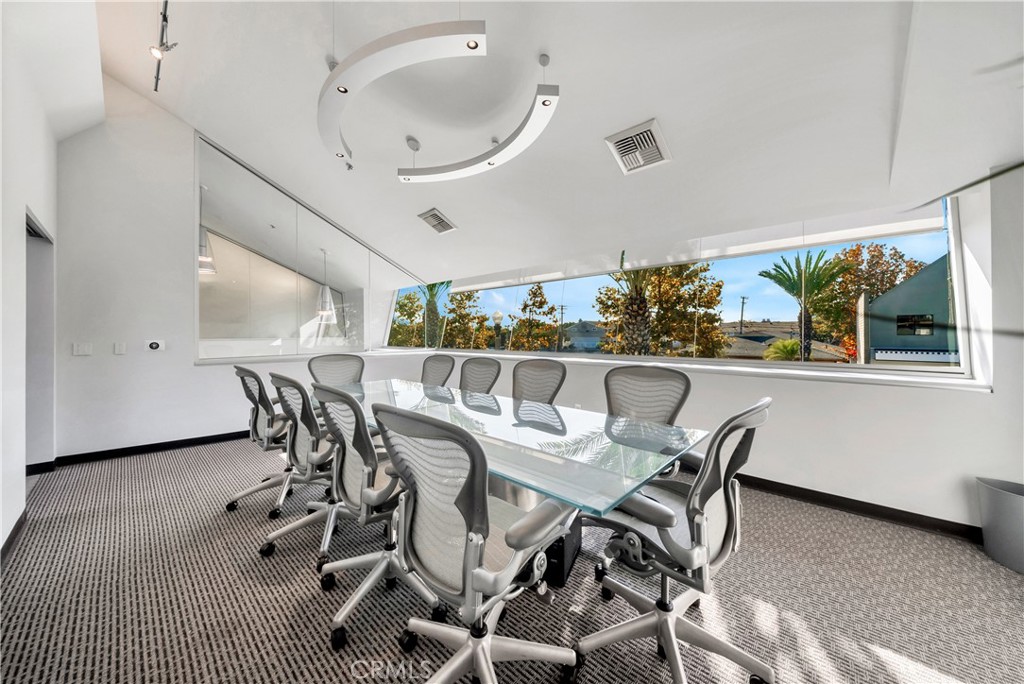 24691 Del Prado Avenue Dana Point, CA 92629 - Photo 28 of 67 a dining room with furniture and window