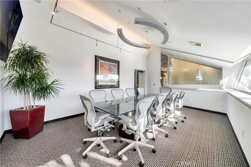 24691 Del Prado Avenue Dana Point, CA 92629 - Photo 29 of 67 a view of a livingroom with furniture and a floor to ceiling window