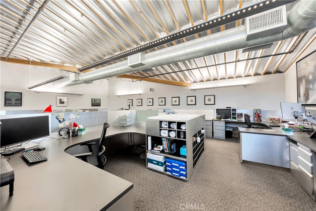 24691 Del Prado Avenue Dana Point, CA 92629 - Photo 36 of 67 a utility room with furniture and a flat screen tv