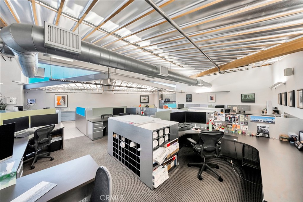 24691 Del Prado Avenue Dana Point, CA 92629 - Photo 37 of 67 a bed room with a bed and a desk