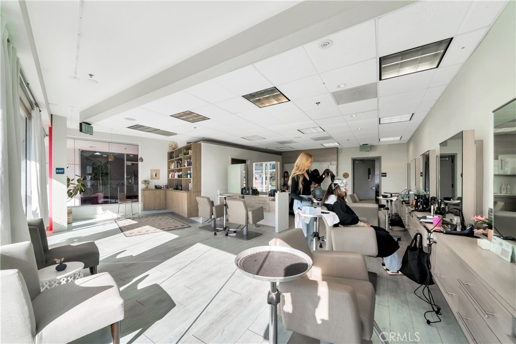 24691 Del Prado Avenue Dana Point, CA 92629 - Photo 58 of 67 a living room with furniture and a large window