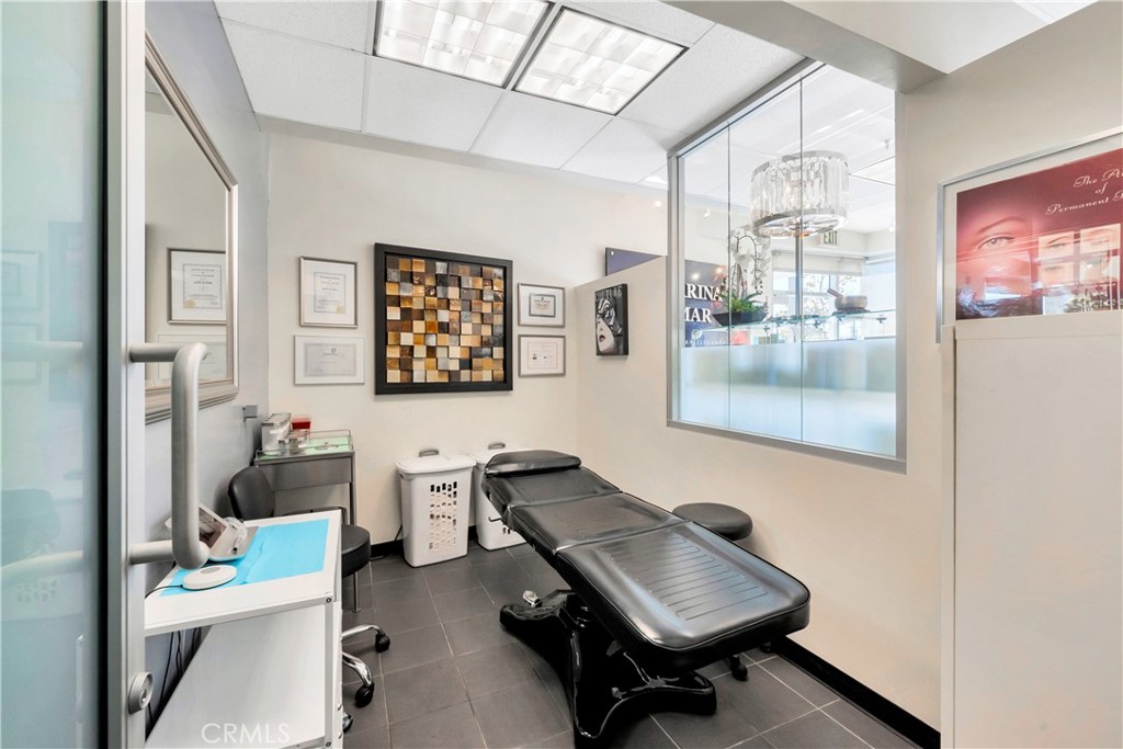 24691 Del Prado Avenue Dana Point, CA 92629 - Photo 64 of 67 a living room with furniture and a window