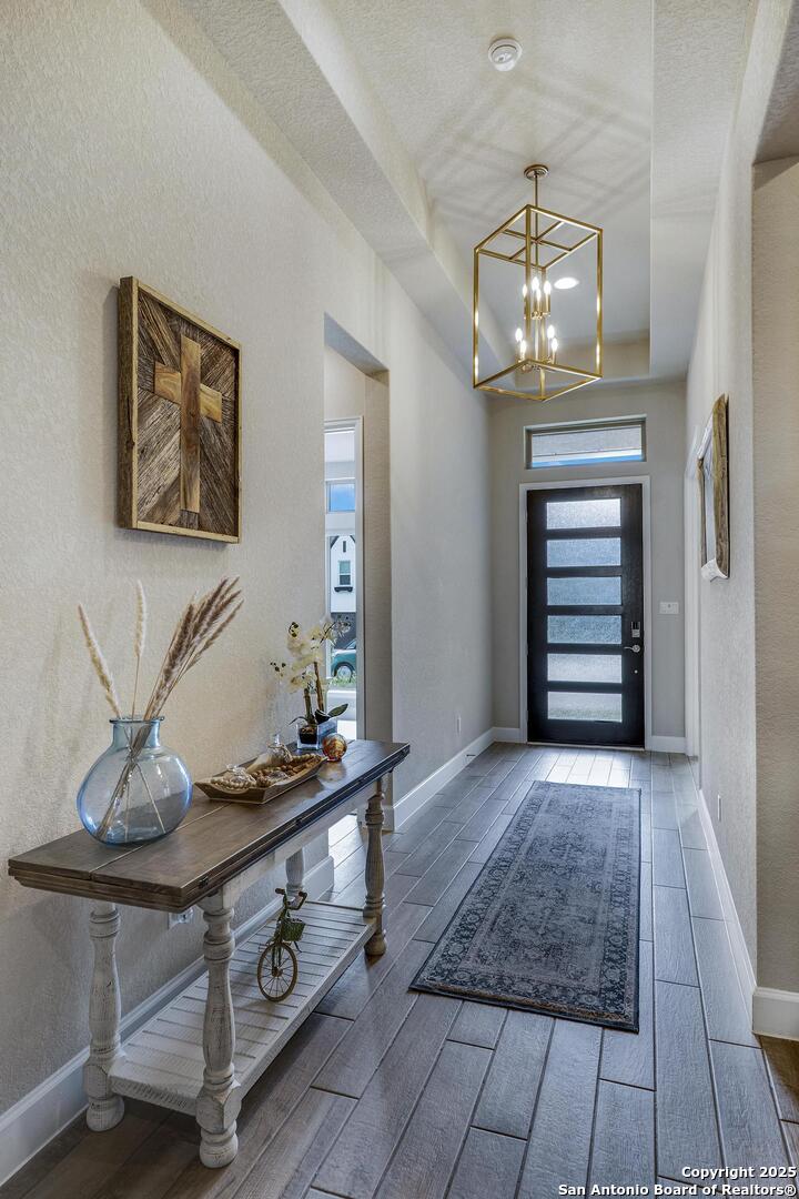 10027 Sarah Place Boerne, TX 78006 - Photo 16 of 47 a view of room with furniture and wooden floor