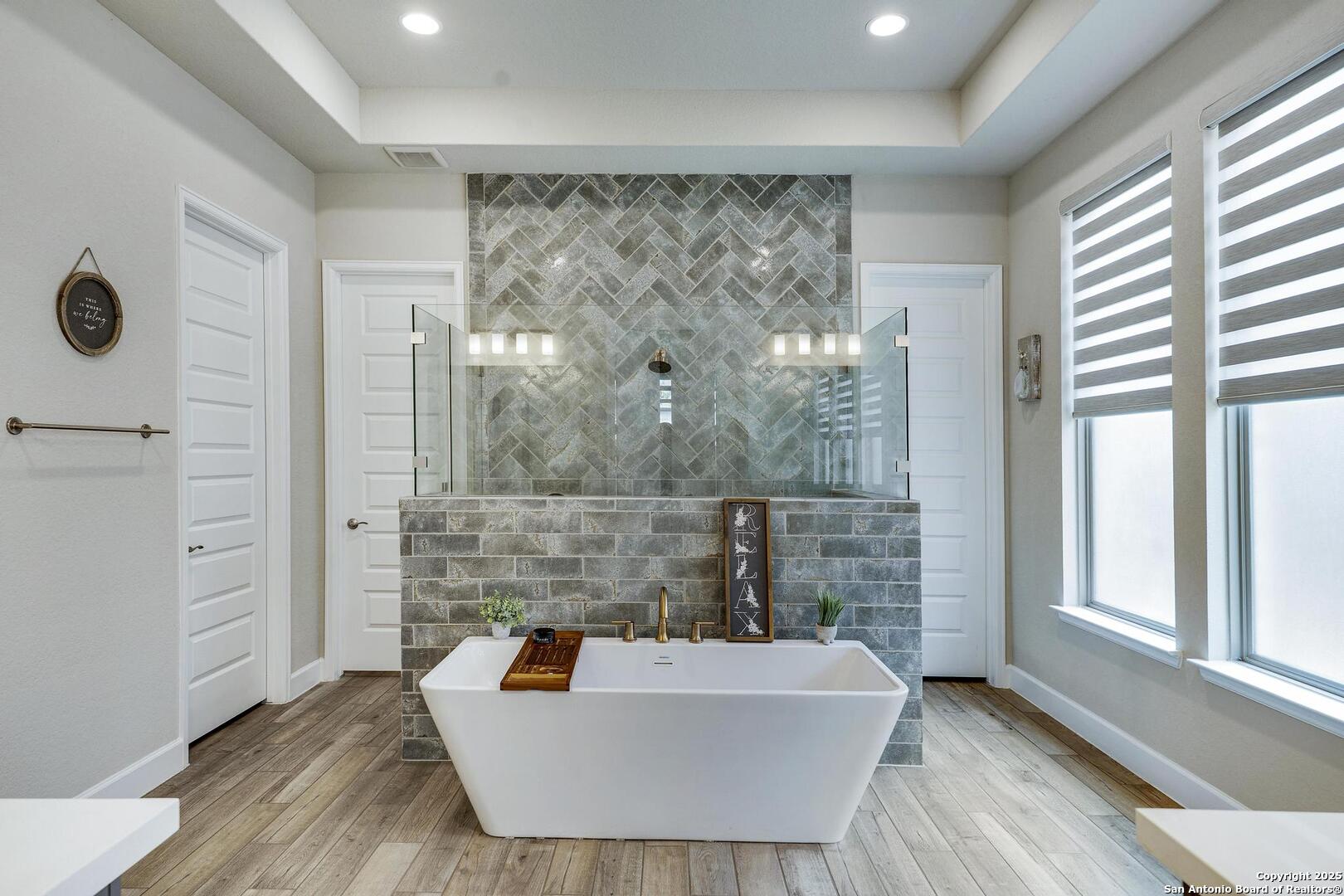 10027 Sarah Place Boerne, TX 78006 - Photo 20 of 47 a living room with furniture and a large window
