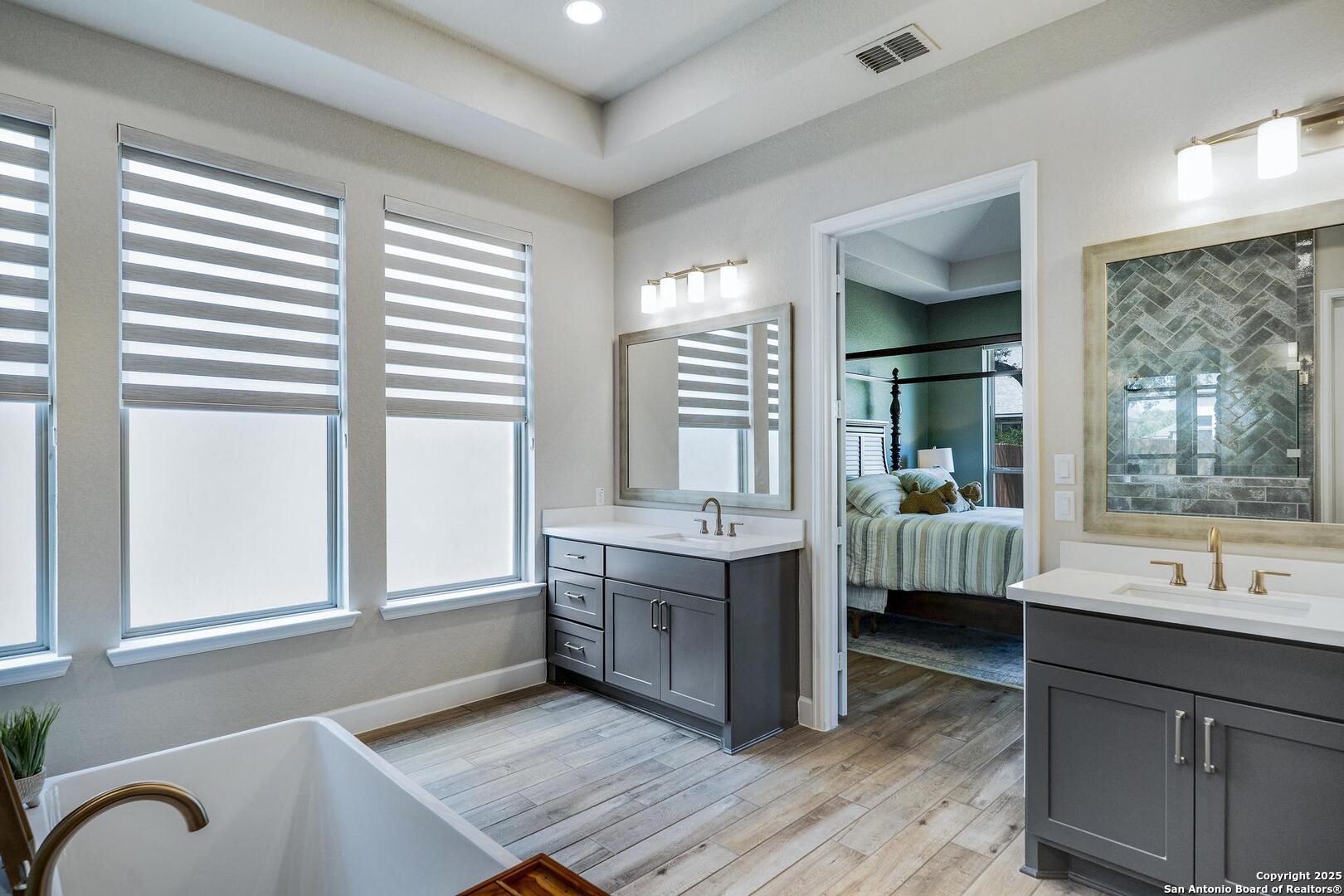 10027 Sarah Place Boerne, TX 78006 - Photo 22 of 47 a room with a bed and a window