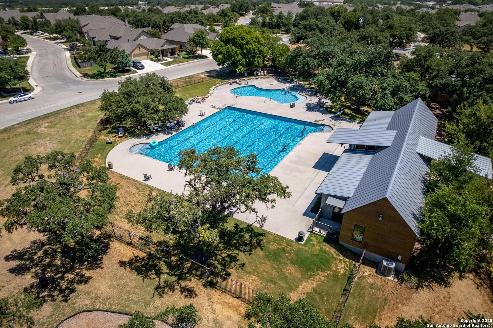 10027 Sarah Place Boerne, TX 78006 - Photo 38 of 47 an aerial view of a house with swimming pool and outdoor space