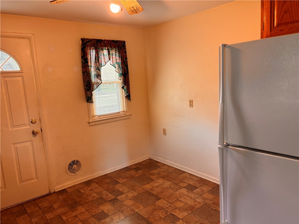 427 Fetzner Road Greece, NY 14626 - Photo 10 of 39 Room for kitchen table with view of side yard