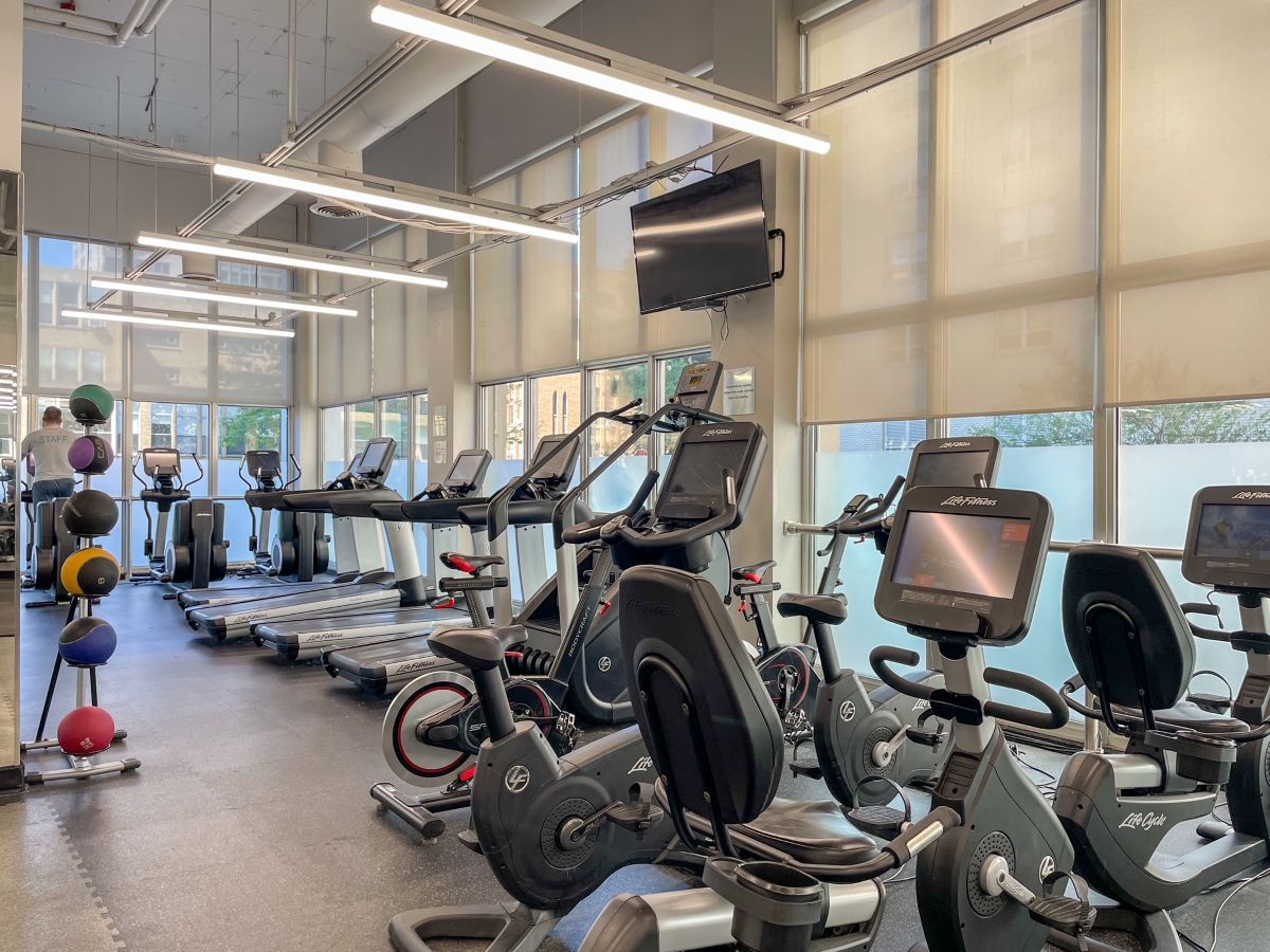 655 West Irving Park Road, Unit 4702 Chicago, IL 60613 - Photo 15 of 17 a view of a room with gym equipment