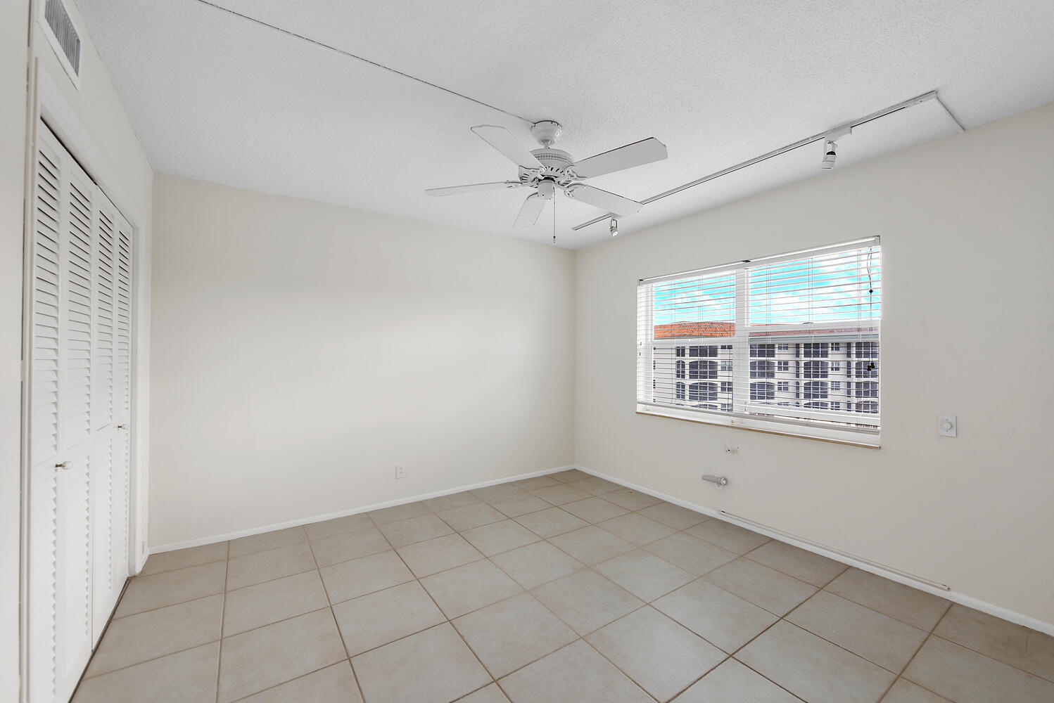 2871 North Ocean Boulevard, Unit F429 Boca Raton, FL 33431 - Photo 14 of 38 a view of an empty room with a window