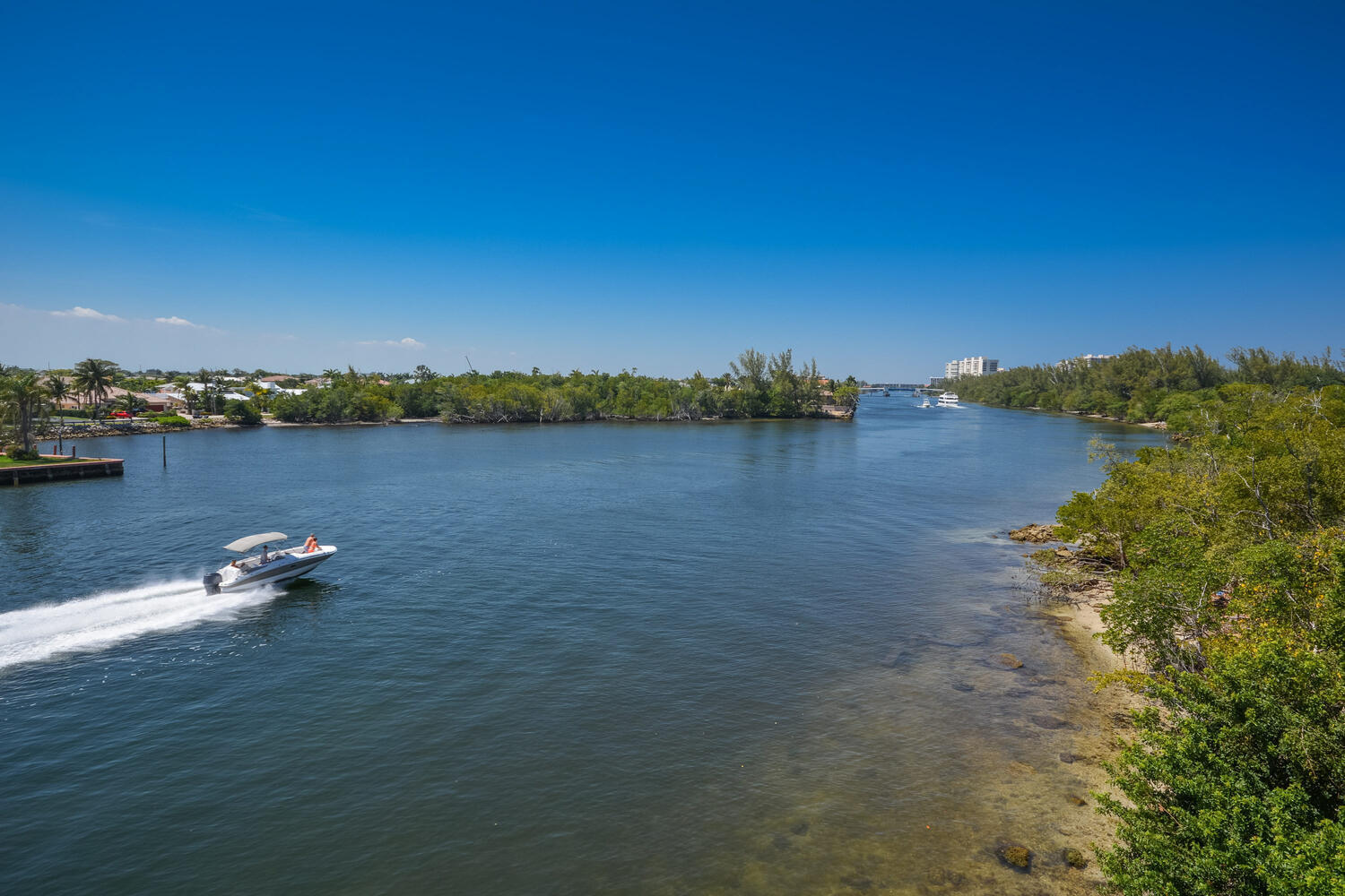 2871 North Ocean Boulevard, Unit F429 Boca Raton, FL 33431 - Photo 29 of 38 a view of a lake with houses in outdoor space