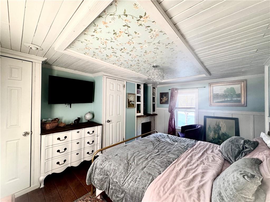 110 Boquet Street Ligonier, PA 15658 - Photo 13 of 16 a bedroom with furniture and flat screen tv