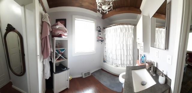 110 Boquet Street Ligonier, PA 15658 - Photo 16 of 16 a view of a hallway with wooden floor and staircase