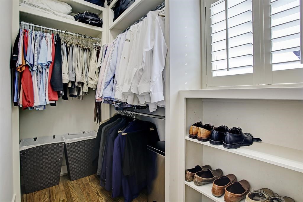 246 Detering Street Houston, TX 77007 - Photo 20 of 27 a view of walk in closet with clothes and shoes
