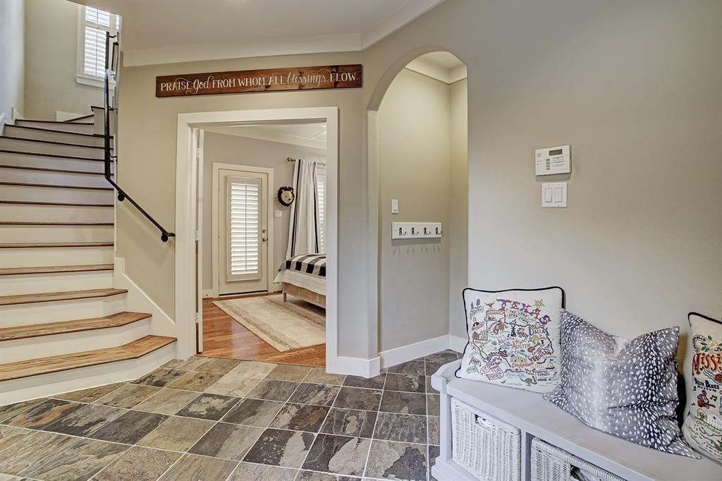 246 Detering Street Houston, TX 77007 - Photo 5 of 27 a view of a bedroom with wooden floor and stairs