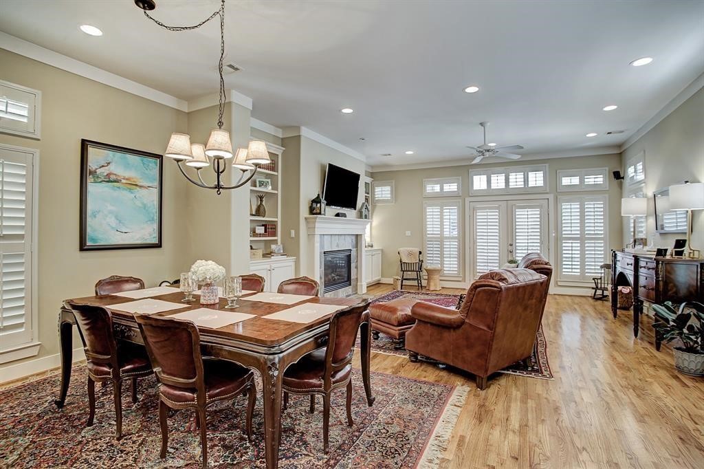 246 Detering Street Houston, TX 77007 - Photo 8 of 27 a view of a dining room with furniture window and wooden floor